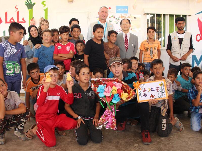 The paintings Ala did with her feet are displayed outside the Mafraq Makani Centre. (Twitter)