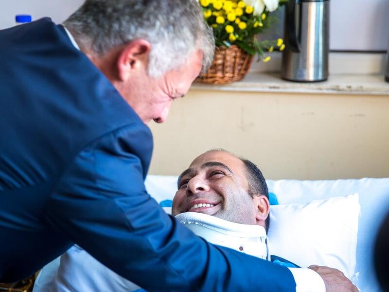 King Abdullah checks on security personnel injured in the Fuheis terrorist attack (Twitter)