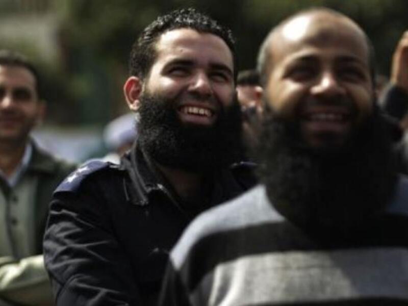 A bearded Egyptian police officer takes part in a protest in Cairo. (AFP/ File)
