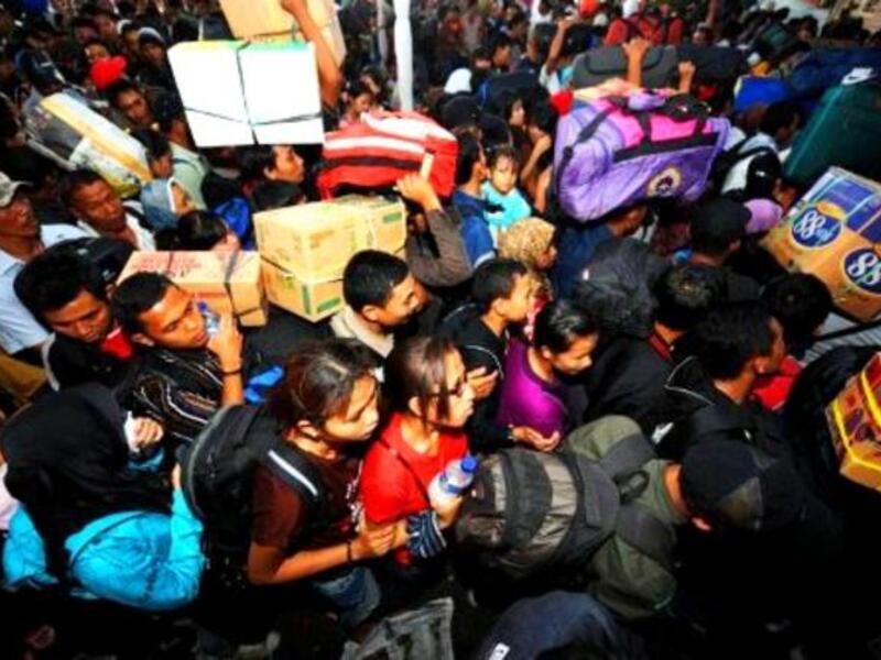 INDONESIA, JAKARTA: Eid preparations include city workers traveling to be with family, making their way home to celebrate Eid.  A  mini migration of Indonesians, seen at this Jakarta train station, heading to their hometowns to celebrate the close of this month of faithful devotion and to enjoy a break from work in the city.