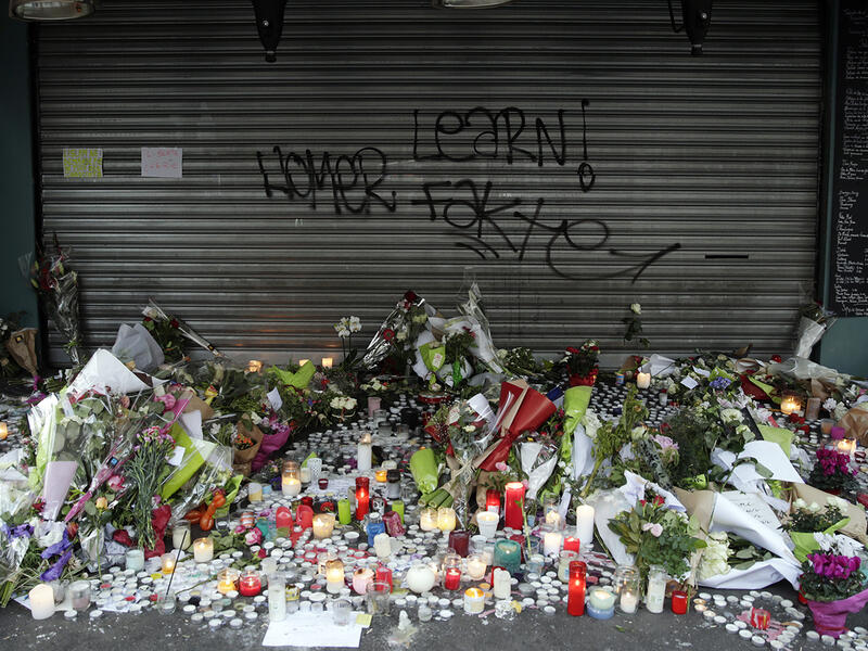 flowers vigil paris attacks 