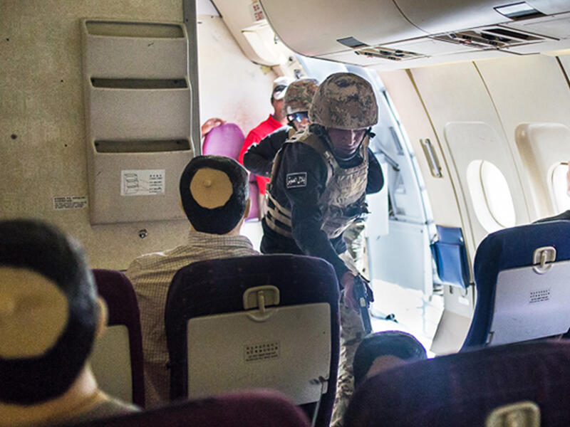 The Jordan team participates in the Airbus seizure event, in which a team boards a passenger aircraft during a “hostage” situation and shoots a suspected militant.

