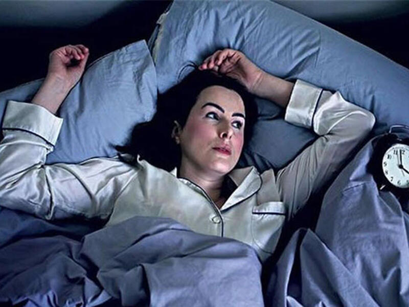 mother sleeps eyes wide open 