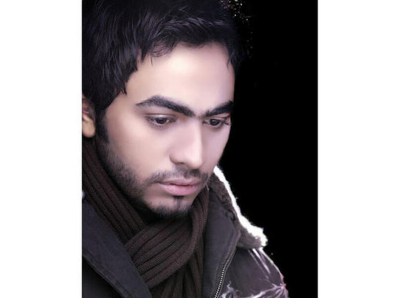 Tamer tones down with new film on hold.