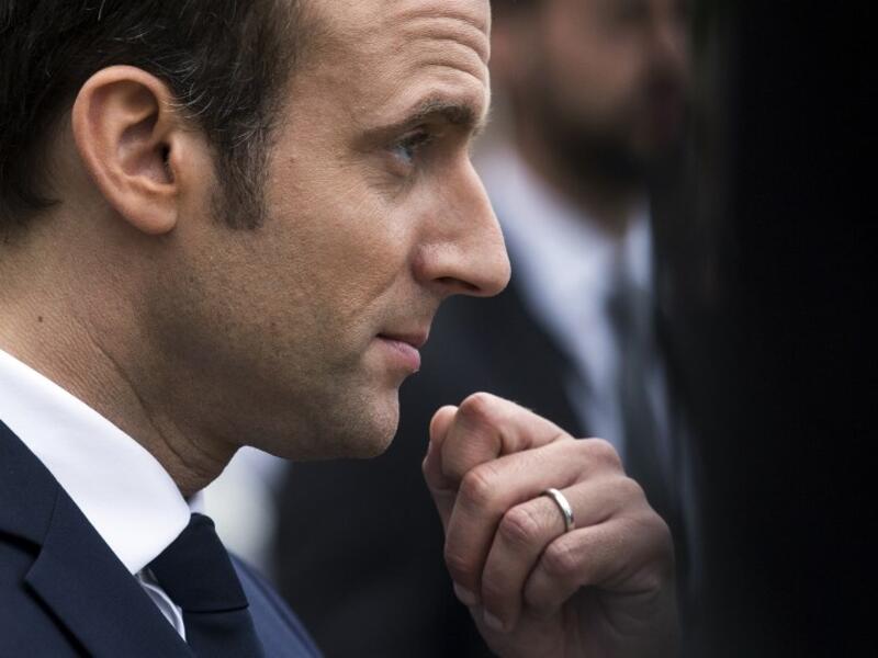 “If you are not in danger, you should go back to your country,” French President Emmanuel Macron told a Moroccan asylum seeker last week (AFP)