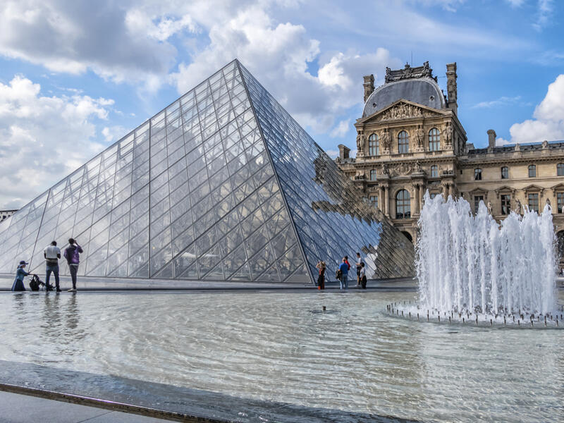 View of pyramid and fountain at main courtyard (Cour Napoleon) of Louvre Museum. (Shutterstock/ File)