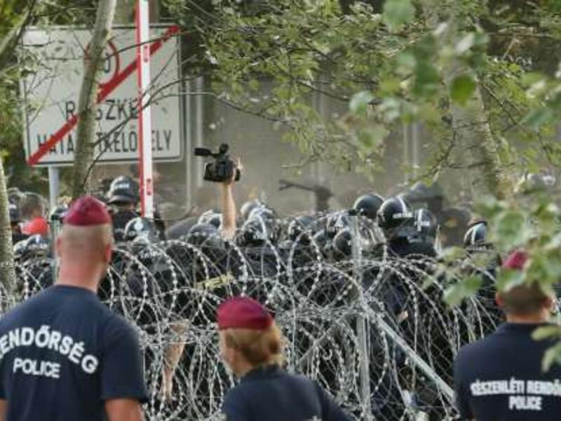 Hungarian border police apparently made the scarecrows (AFP/Sandor Gemesi)