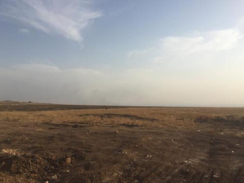 Fires in the distance started by Daesh to confuse coalition jets northeast of Mosul (Al Bawaba/Adam Lucente)