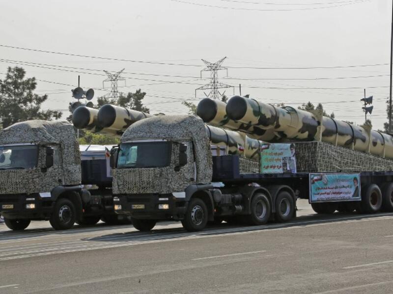A military truck carries missiles during the military parade on Iran's Army Day on April 18, 2018 in Tehran. ATTA KENARE / AFP
