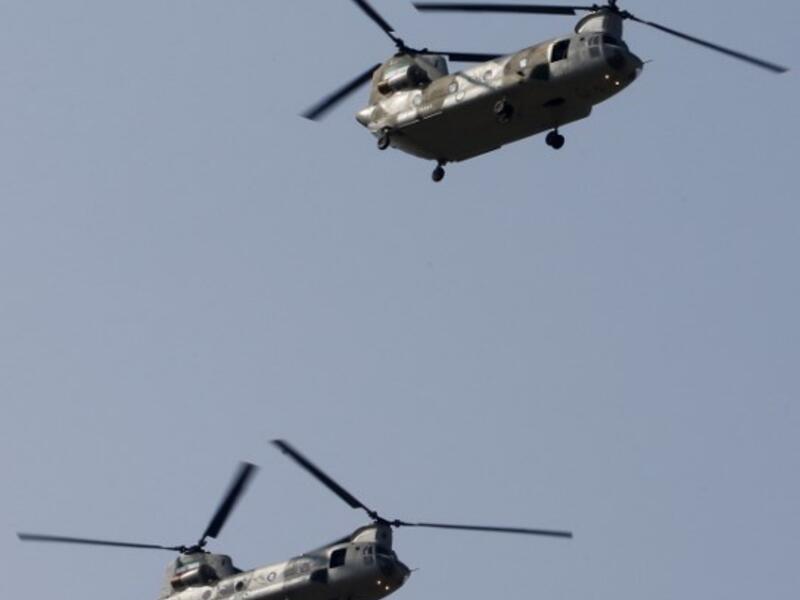 And then there are the towering helicopter's. April 18, 2018 in Tehran. ATTA KENARE / AFP
