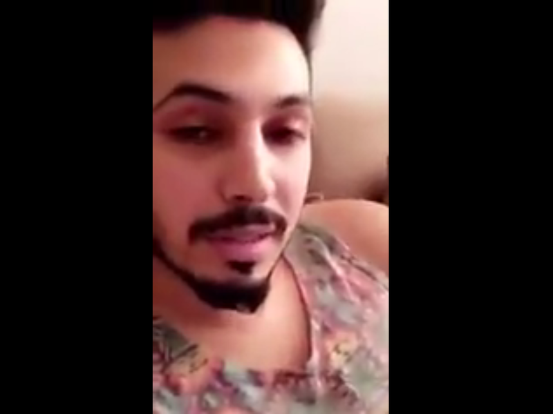 Mamdouh al-Shamri claims the dress he's wearing is from your sister, who left it at his place last night. (Youtube)