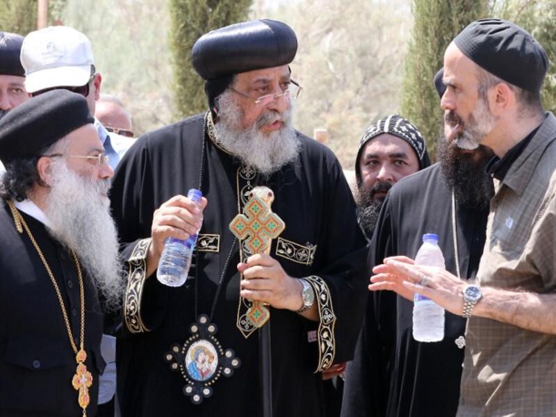 Jordanian Prince Ghazi Bin Mohamed and Pope Tawadros II, the head of Egypt's Coptic Orthodox Church, visit Bethany beyond the Jordan river. (AFP/Khalil Mazraawi)