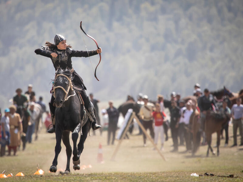 Woman competing in archery on horseback game (Shutterstock/File Photo)