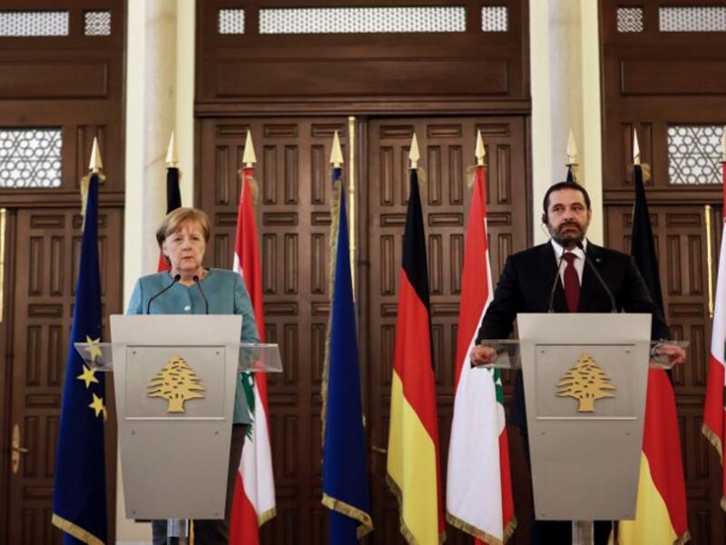 German Chancellor Angela Merkel (L) gives a press conference with Lebanese Prime Minister Saad Hariri at the prime minister's office in the capital Beirut, June 22, 2018 during her official visit to Lebanon. 
(AFP/Anwar Amro)
