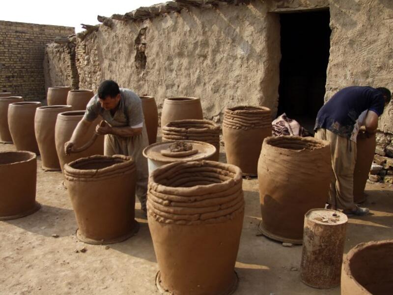 Iraqis making clay pots in Najaf on November 11, 2018. Pottery has deep roots in Iraq, where ancient civilisations turned to clay to build their homes, shape their cooking utensils, and even make their ovens.
Haidar HAMDANI / AFP