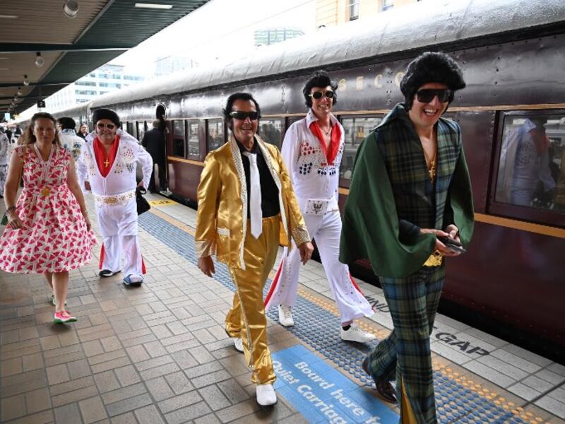 Elvis fans arrive at Central station before boarding a train to The Parkes Elvis Festival, in Sydney on January 10, 2019. The Parkes Elvis Festival is an annual event celebrating the music and life of Elvis Presley in the New South Wales town of Parkes.
PETER PARKS / AFP
