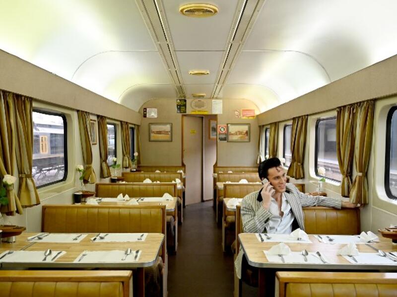An Elvis fan sits on a train after leaving Central station to head to The Parkes Elvis Festival, in Sydney on January 10, 2019. The Parkes Elvis Festival is an annual event celebrating the music and life of Elvis Presley in the New South Wales town of Parkes.
PETER PARKS / AFP
