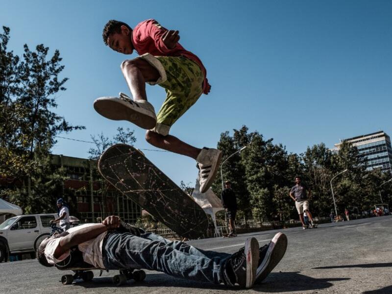 A skateboarder performs on a street in Addis Ababa on February 3, 2019 during the third Car Free Day promoted by local NGOs and the Ethiopian Government to appeal a healthy life style and a less air pollution of the capital city. 
EDUARDO SOTERAS / AFP