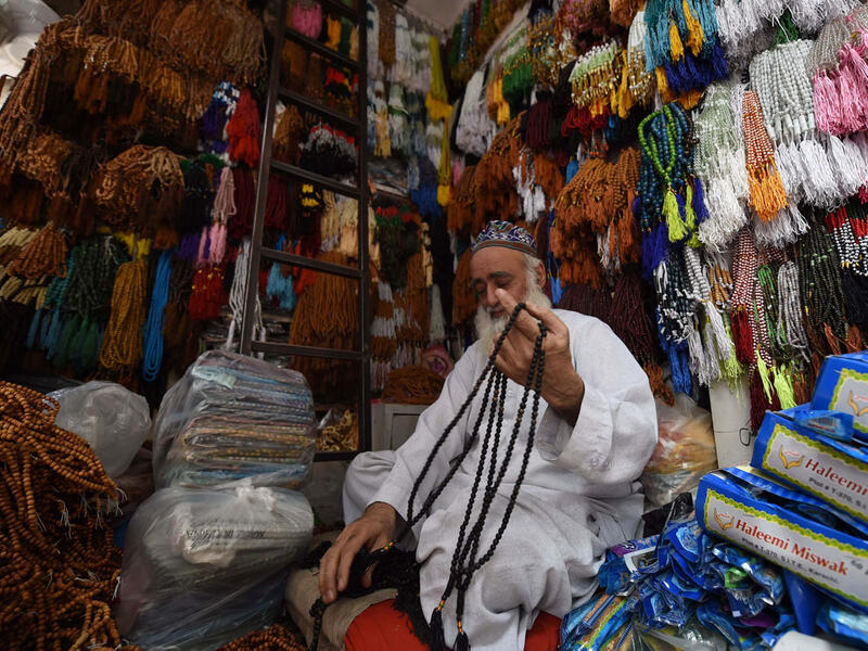 A Pakistani vendor arranges rosary beads at his shop ahead of the Islamic holy month of Ramadan in Peshawar. Muslims are preparing for Islam’s holy month of Ramadan, which is calculated on the sighting of the new moon, and during which they fast from dawn until dusk. 
AFP Photo/A Majeed