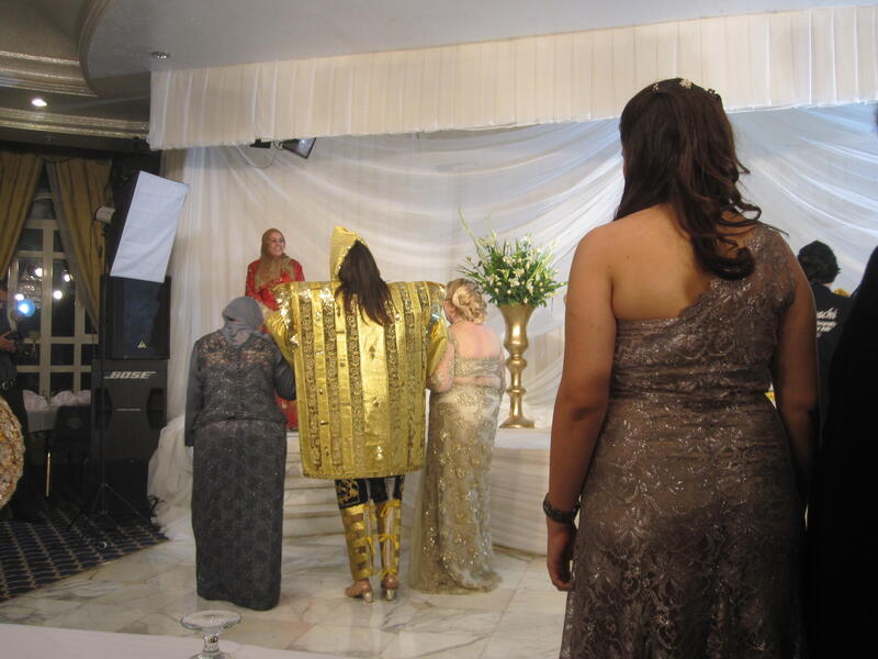 Step on fish, Tunisia: This ritual is very common among the people of the city of Sfax. A big fish, decorated with colorful strings, is brought to the couple on a dish. The groom holds his bride's hand as she takes seven steps on the fish, then they switch roles. (erinegold.files.wordpress.com)