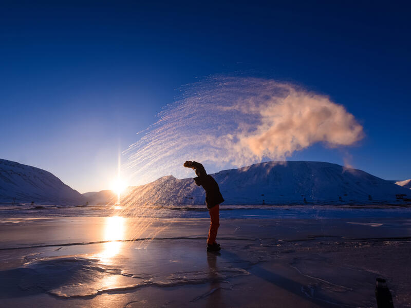 Frost effect hot water freezes man pours boiling water. (Shutterstock/ File Photo)