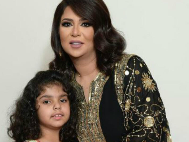 Nawal Al Kuwaitiyeh chose a Abaya from HAMSA By Sharifa Al Ghanim for her TV appearance in the show