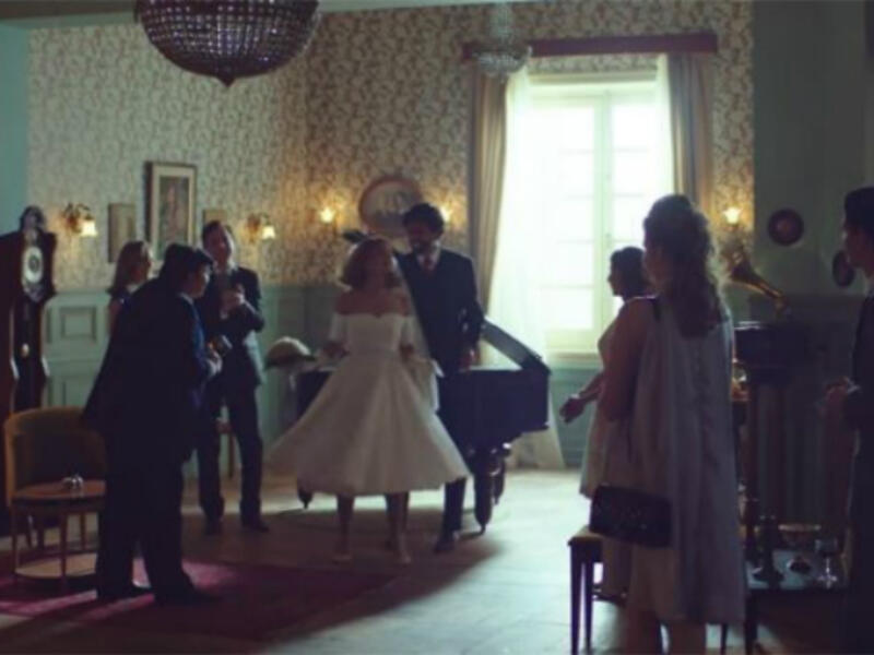 Egyptian Russian Actress Nelly Karim slipped into a wedding dress that suits the sixties which is the era 