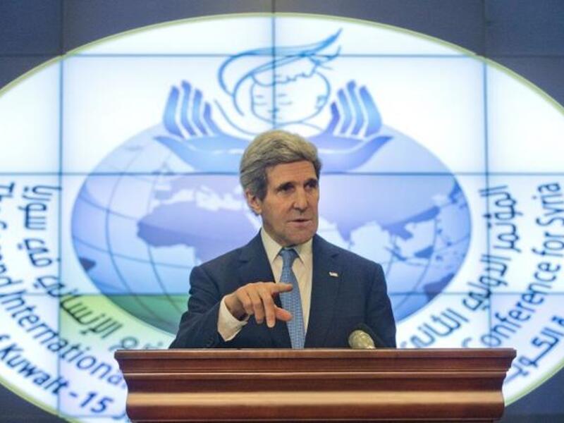 US Secretary of State John Kerry speaks during a news conference on the sidelines of the Second International Humanitarian Pledging Conference for Syria, at the Bayan Palace in Kuwait City, on January 15, 2014. [AFP]