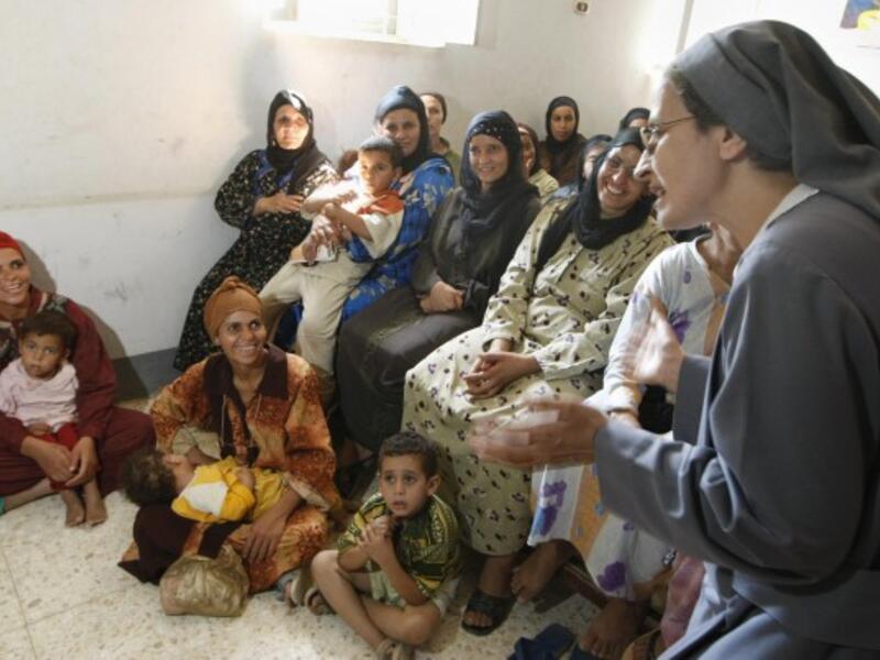 Egyptian women attend a lecture on female genital mutilation in Beni Suef. (Cris Bouroncle/AFP/Getty Images)