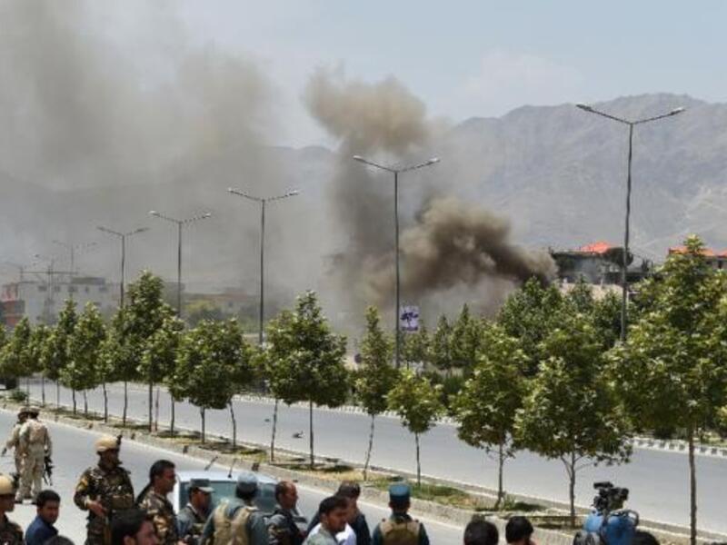 Black smoke billows from the Afghan parliament building in Kabul on June 22, 2015. (AFP/Shah Marai)