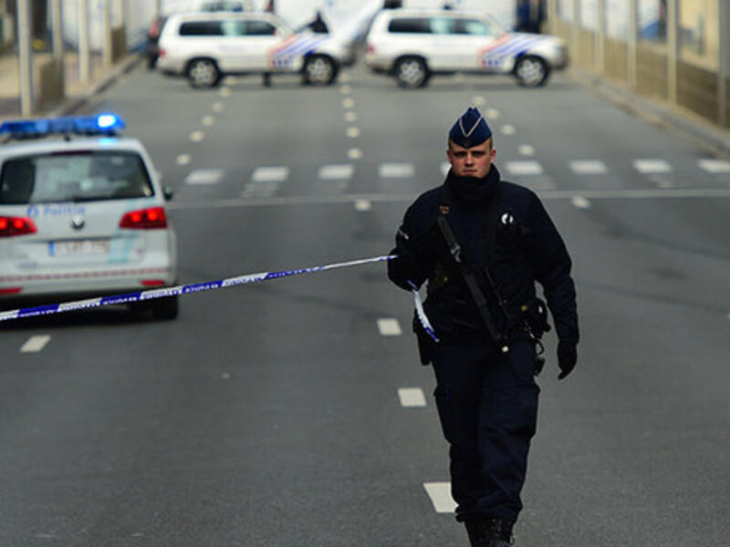 A police officers sets a security perimeter near Maalbeek metro station, on March 22, 2016. (AFP/File)