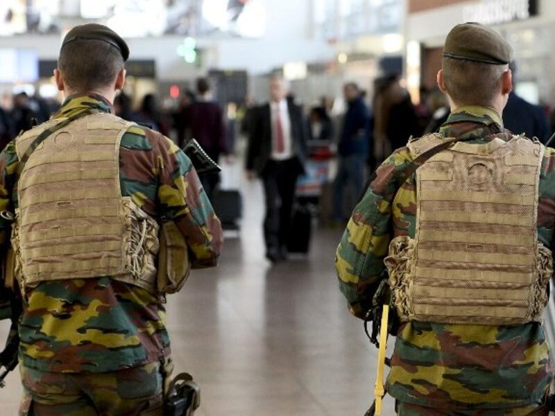Military police patrol the Brussels Airport in Zaventem, eastern Brussels, November 18, 2015. (AFP/Belga/Dirk Waem)