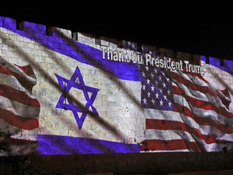 The Israeli and United States flags are projected on the walls of the ramparts of Jerusalem's Old City, to mark the opening of the new US embassy on May 14, 2018. (AFP/ File Photo)