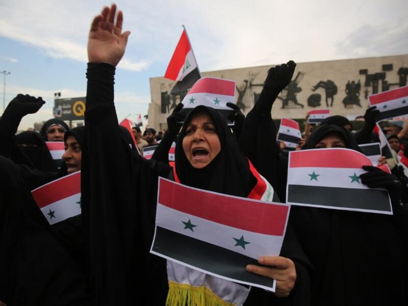 Women protestors in Baghdad’s Tahir Region on April 15, 2017 against western military strikes on Syria for the alleged chemical attacks on Douma, AHMAD AL-RUBAYE / AFP