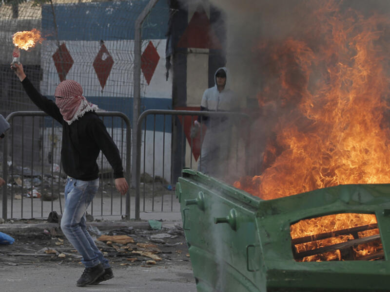 Molotov cocktail during clashes with Israeli security forces (AFP/File Photo)