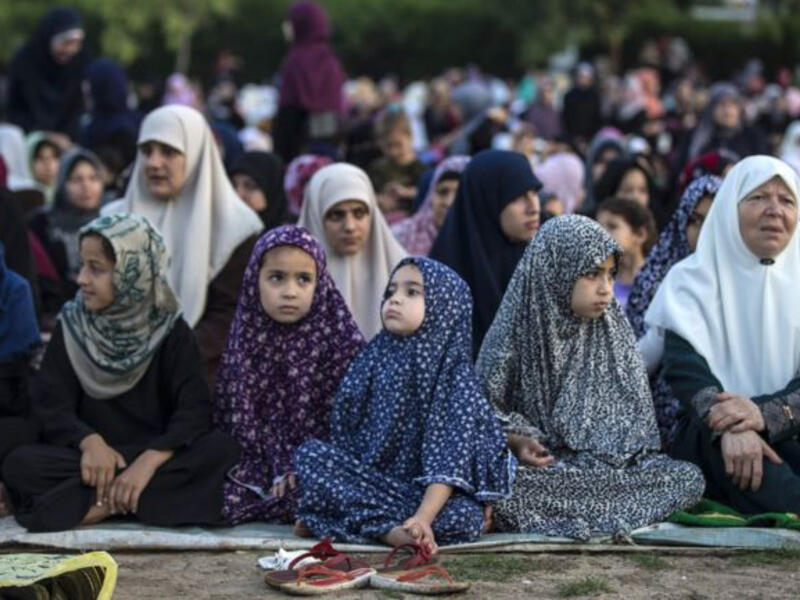 Women and girls gather to pray in Gaza city during Eid. While the electricity crisis has left residents with only a few hours of power per day during the holy month of Ramadan, electricity came in time for the Eid celebrations. The Egyptian authorities allowed fuel to enter Gaza on Wednesday, enabling Gaza’s only power plant to resume operations. 