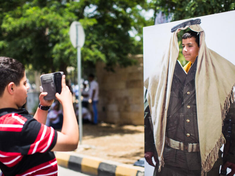 Ever wanted to be a bedouin soldier holding a rifle? These face cut-outs were a hit, with kids and adults posing for pictures as soldiers in uniform, or as a family in traditional clothing. 