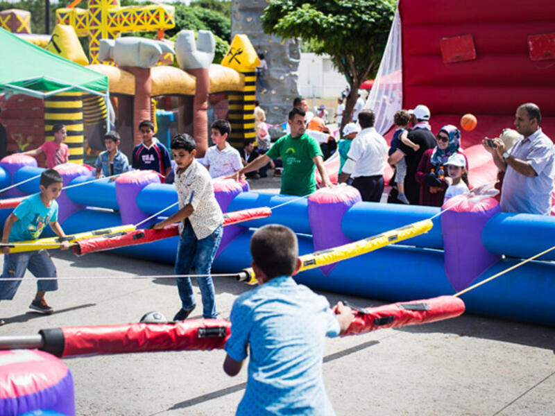 Sadly, only kids were allowed to play in the huge play area complete with bouncy castles, human foosball, and bubble soccer.