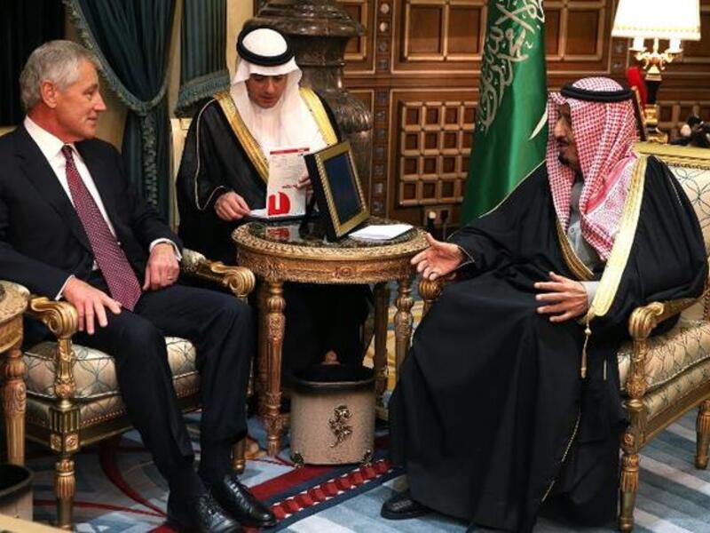 U.S. Secretary of Defense Chuck Hagel meets with Saudi Crown Prince Salman bin Abdulaziz while Ambassador Adel Al-Jabeir listens, on December 9, 2013 in Riyadh. [AFP]