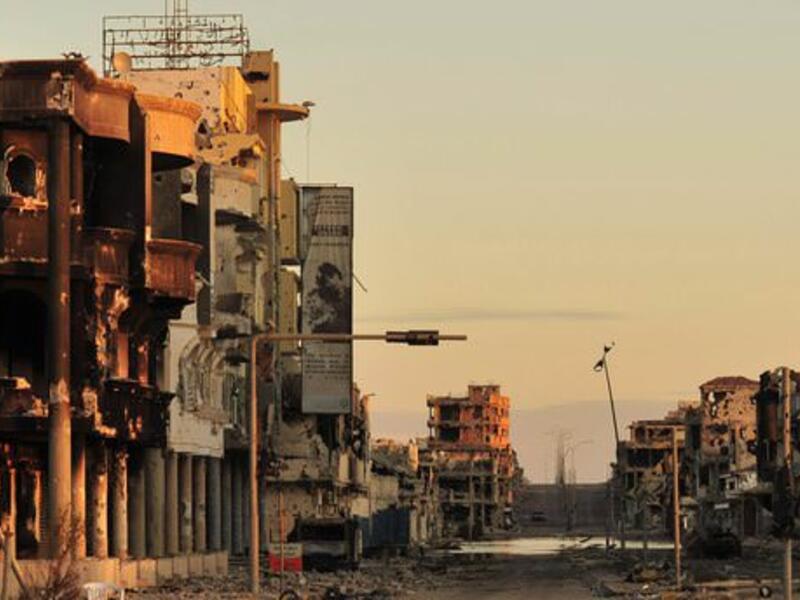 Sirte, Libya has faced extensive bombings and fighting, pushing families outside of the city. (AFP/File)