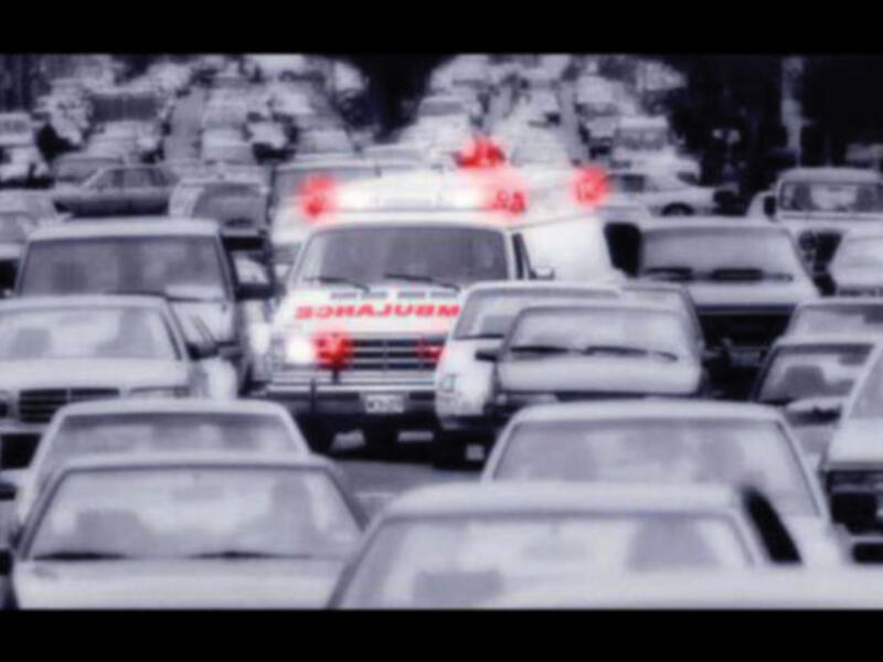 ambulance in traffic jam