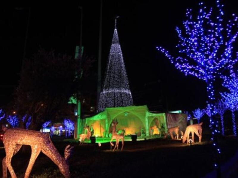 A Christmas tree and ornaments decorate a park in the Beirut suburb of Sin el-Fil.