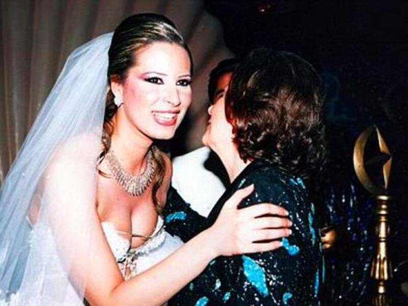 9Father of the Bride: Every Dad's proud dream is to see their daughter - particularly an only daughter- married. Here, 
wedded in all the Gaddafi glory bestowed upon her. She also gave birth to a granddaughter to Daddy Gaddafi just last month 
while on the run...She named her after mother, Safia.
