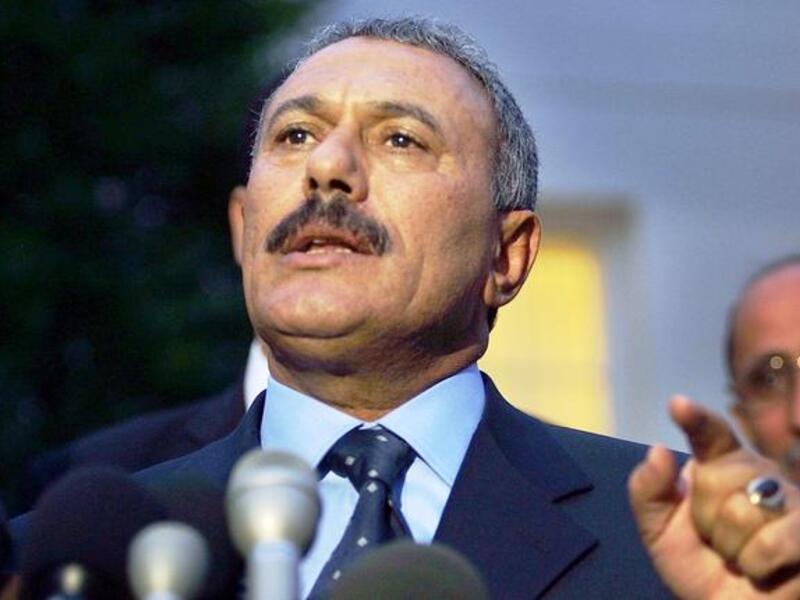 Peak of his own catastrophe: While threatening to finish his people off til the last drop of Libyan blood, 
Gaddafi has the 'gall' to comment, even preach on a fellow besieged Arab dictatorship: On Yemen's affairs and Ali Abdullah
 Saleh: 'Enough bloodshed; Saleh must step down, he is not wanted!'