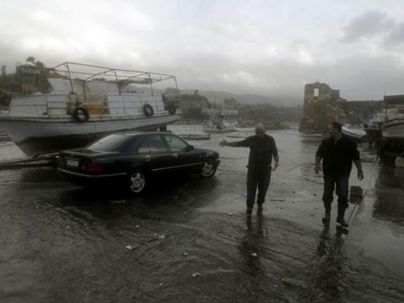 Lebanese fishermen check their boats in the ancient northern port of Byblos.