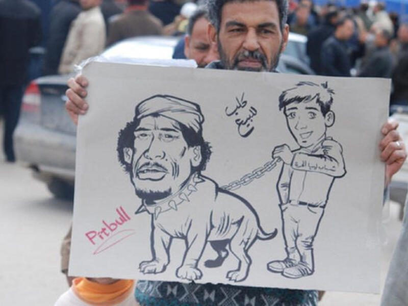 The leader may have labeled his people as cockroaches, cats and mice, but the people spit back the most notorious of insults with &#039;dog&#039;.