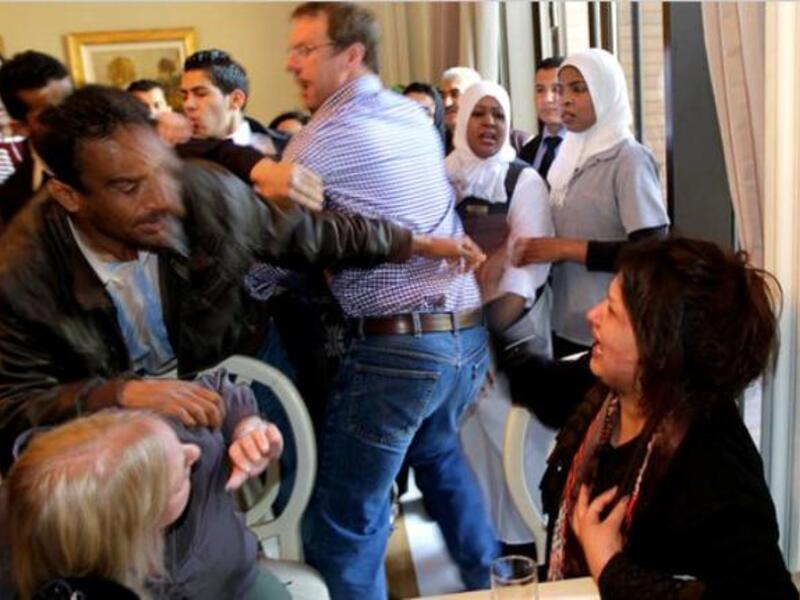 At one point she tried to shout to us in English, “15 men slept with me.”