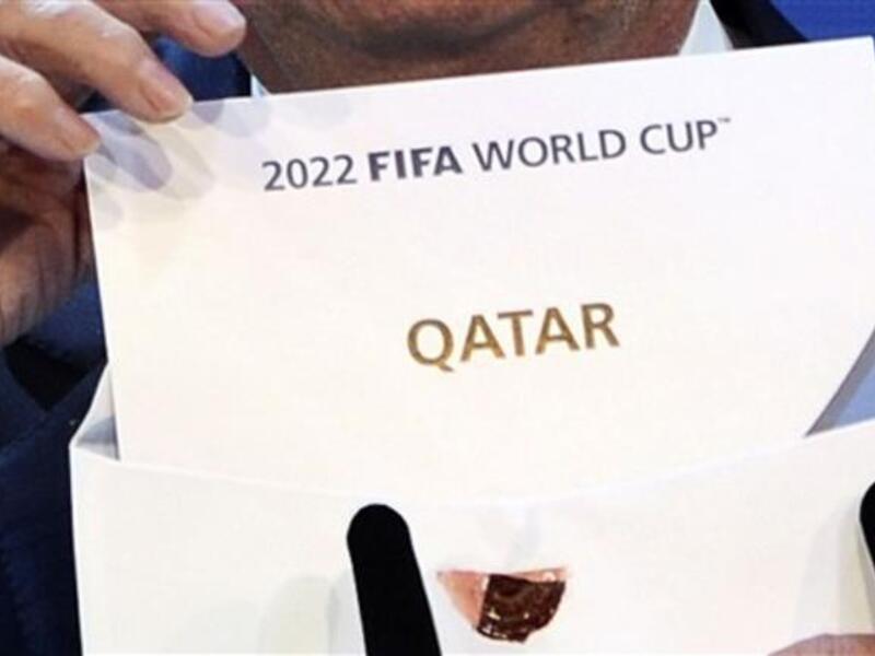FIFA president Joseph Blatter opens the envelope to reveal that Qatar will host the 2022 World Cup at the FIFAheadquarters in Zurich.