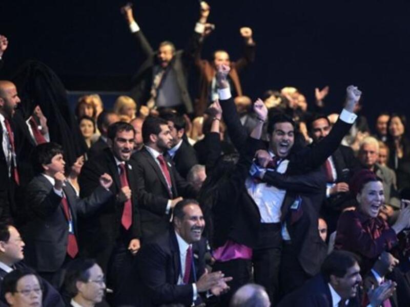Members of the Qatari delegation celebrate following the official announcement of the 2022 World Cup host country at the FIFA headquarters in Zurich.