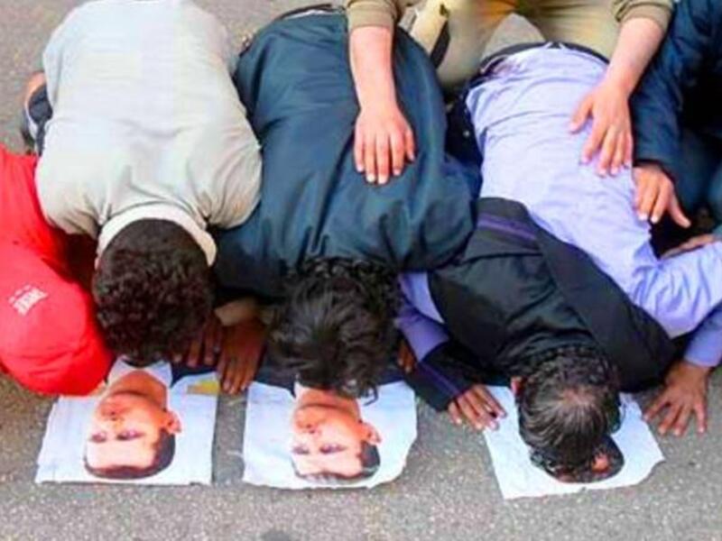 More Mosque Massacres: Reports are rife of worshipers under attack as they 
left their mosques. One witness, Hamawi, said buses packed with soldiers and police surrounded every mosque in Hama. Crowds chanted, "We will not kneel."- implying their supplication was to God alone, and that Syria's regime could no longer rule them by force.
